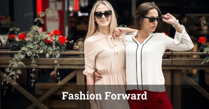 Two stylish women posing outdoors in trendy outfits and sunglasses, representing the theme of Fashion.