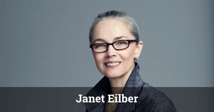 Janet Eilber dancing on stage, demonstrating elegant and expressive choreography.