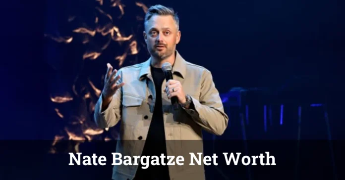 Nate Bargatze net worth delivering a stand-up performance on stage during his 