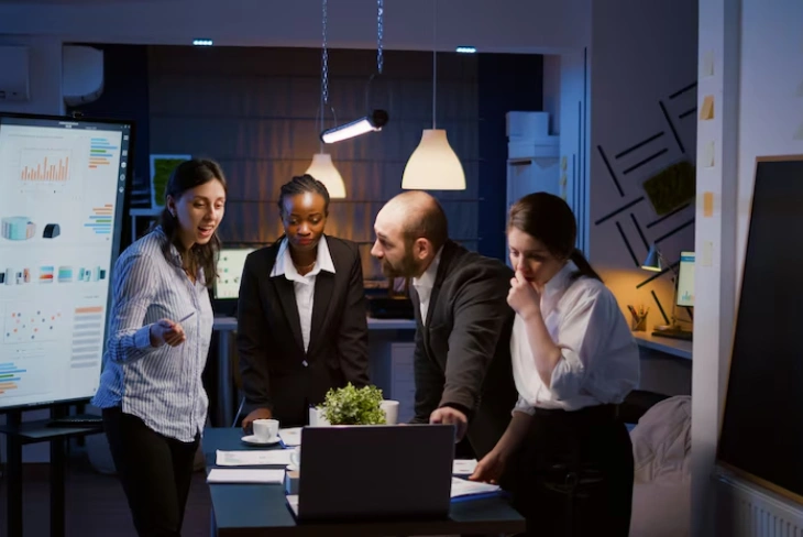 Team brainstorming creative consulting solutions in a vibrant office setting.