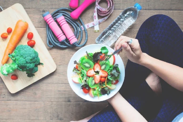 Person enjoying a nutritious meal and engaging in physical activity, embodying healthy weight loss practices.