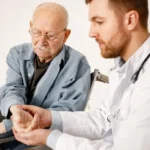 Senior receiving a health check-up from a doctor during a routine visit