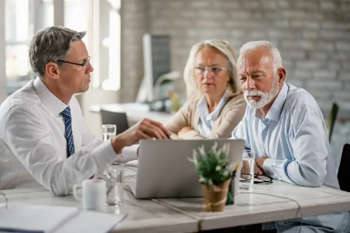 A senior individual consulting with a healthcare provider during a regular check-up, emphasizing the importance of regular check-ups for seniors.