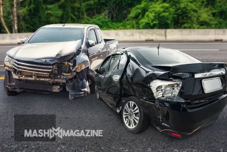 Car accident scene with crumpled vehicles and emergency responders, illustrating the importance of understanding car accident cases and legal processes.