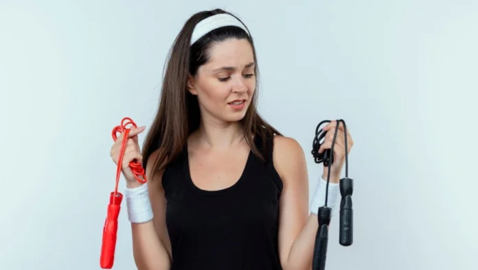 Athlete securing hair extensions and sports before a game.
