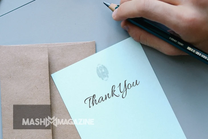 Child practicing good manners by writing a thank you letter