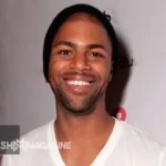 Portrait of William Lancelot Bowles Jr., dentist and former spouse of Phylicia Rashad, smiling in professional attire.