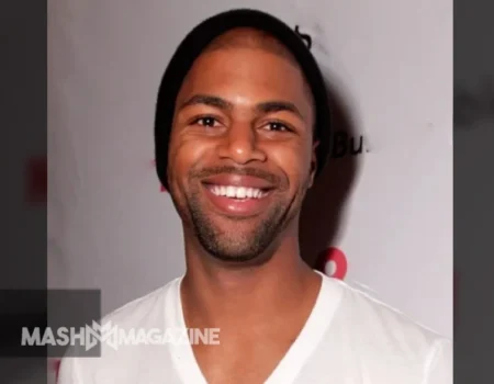 Portrait of William Lancelot Bowles Jr., dentist and former spouse of Phylicia Rashad, smiling in professional attire.