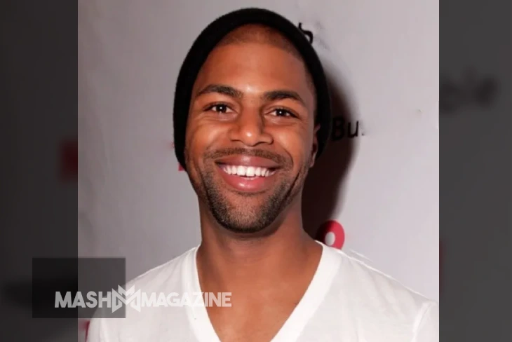 Portrait of William Lancelot Bowles Jr., dentist and former spouse of Phylicia Rashad, smiling in professional attire.