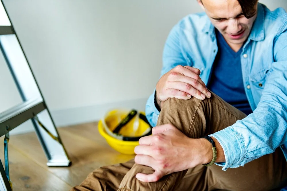 Personal injury lawyer advising client on legal rights and injury compensation.