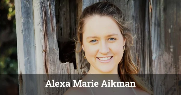 Alexa Marie Aikman, daughter of Troy Aikman, smiling at an event.