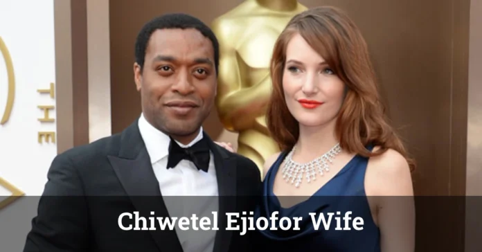 Chiwetel Ejiofor wife at a red carpet event, dressed in a stylish suit.